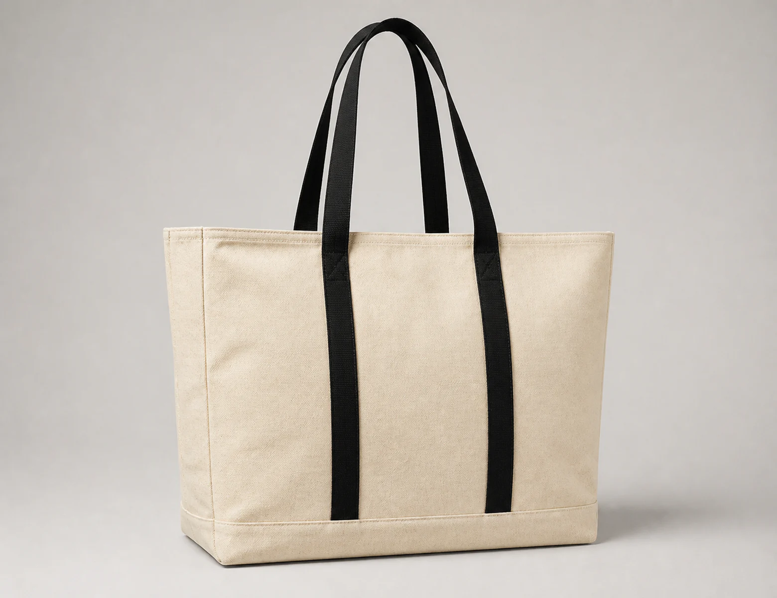 Complete natural canvas tote bag with long black webbing handles